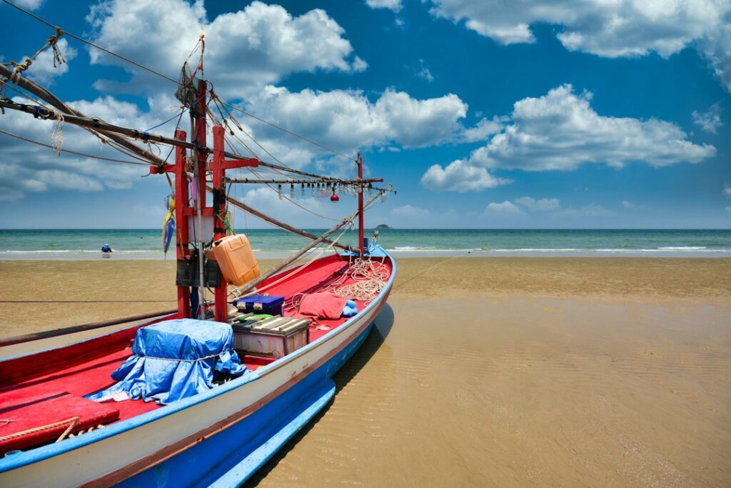 Hua Hin: Traditional fishing boat at a beach of Thailand**