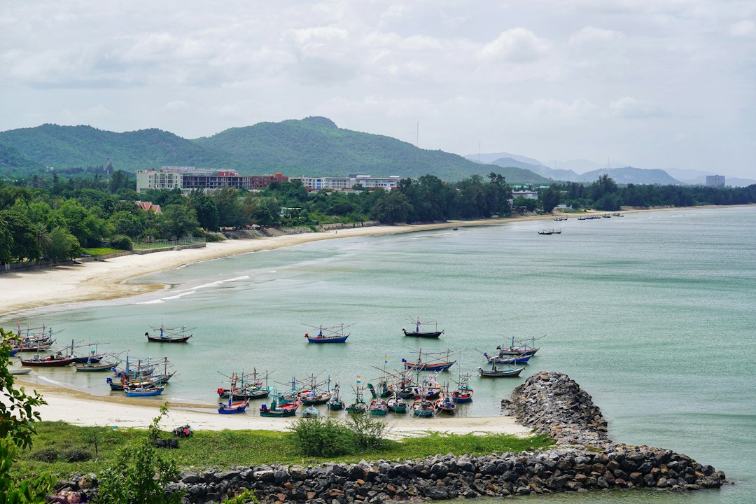 Hua Hin: View of Khao Tao beach and fishing boats.**
