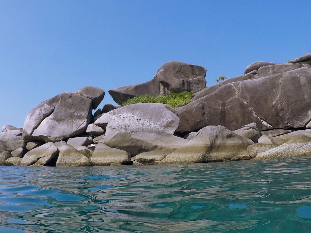 Khao Lak: a group of large rocks in the water**